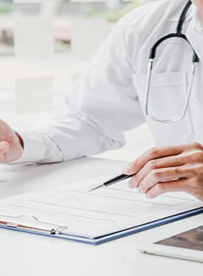 Doctor holding a stethoscope for medical coverage